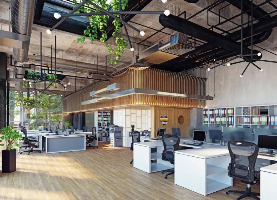 open office with natural wood floor and greenery