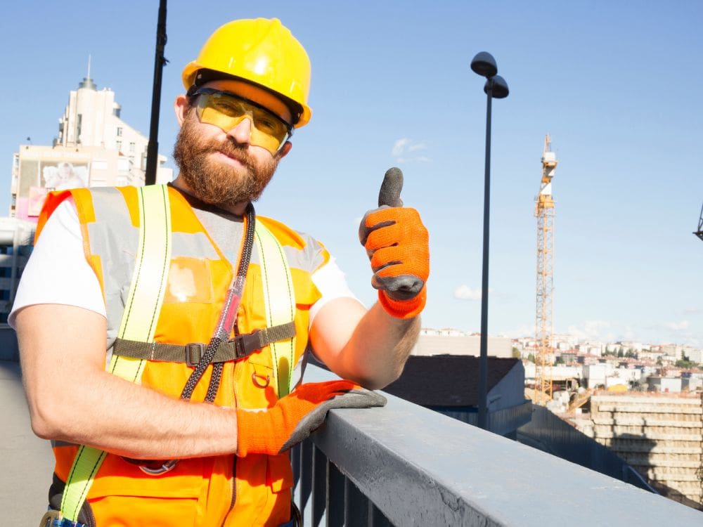 a construction staff giving thumbs up